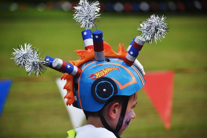 More than 100 people came out to help celebrate at the annual Family Independence Day Celebration & Bike Parade on July 2 at Morgan Sports Complex near Destin Elementary. Youth got the chance to enjoy the bounce house, slip and slide, food trucks, art, face painting, plus participate in the decorated bike parade.