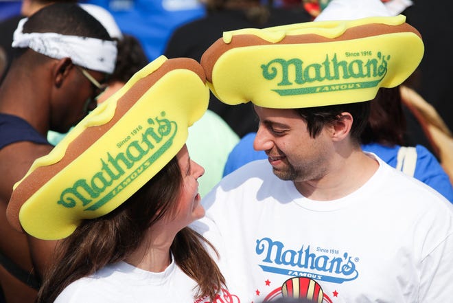 People attend the 2024 Nathan's Famous Fourth of July hot dog eating competition at Coney Island in the Brooklyn borough of New York on July 4, 2024.