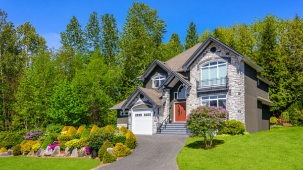 nice home with front yard view from the street in spring